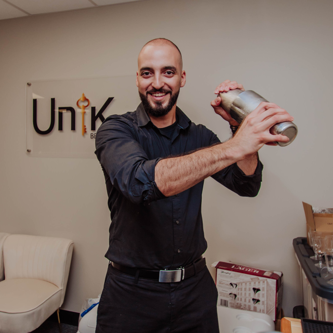Bartender with Cocktail Shakers